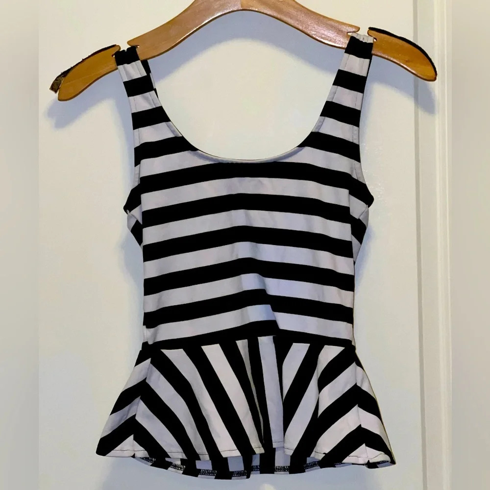 Bebe Stripped Peplum tank top